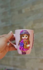   Mug doll with her teddy bear
