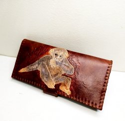 donza woman wallet monkey carving