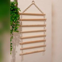A macramé hanger for women's scarves and clothes